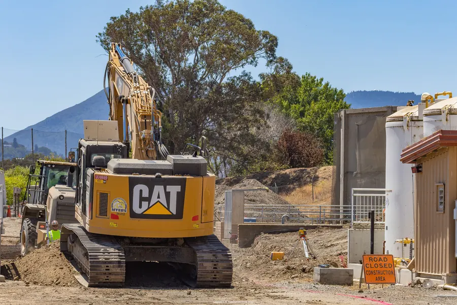 Excavator working in a prepared construction area